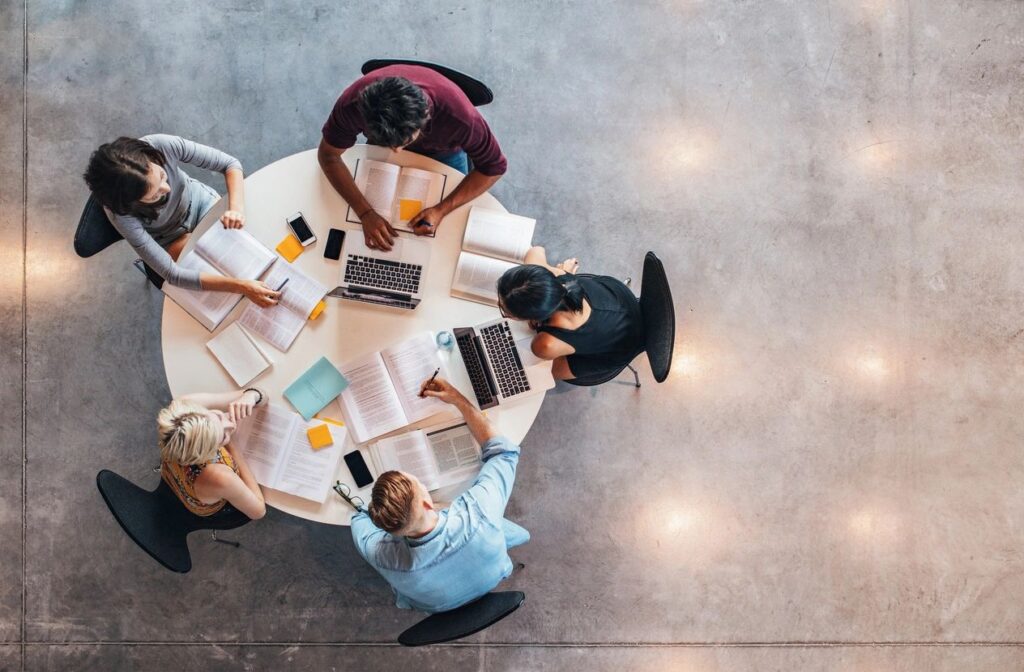 A group of people sitting at a table