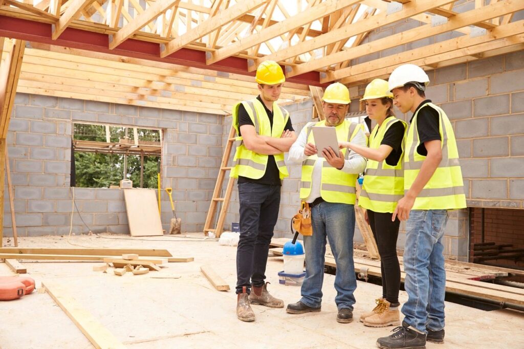 Construction team reviewing information